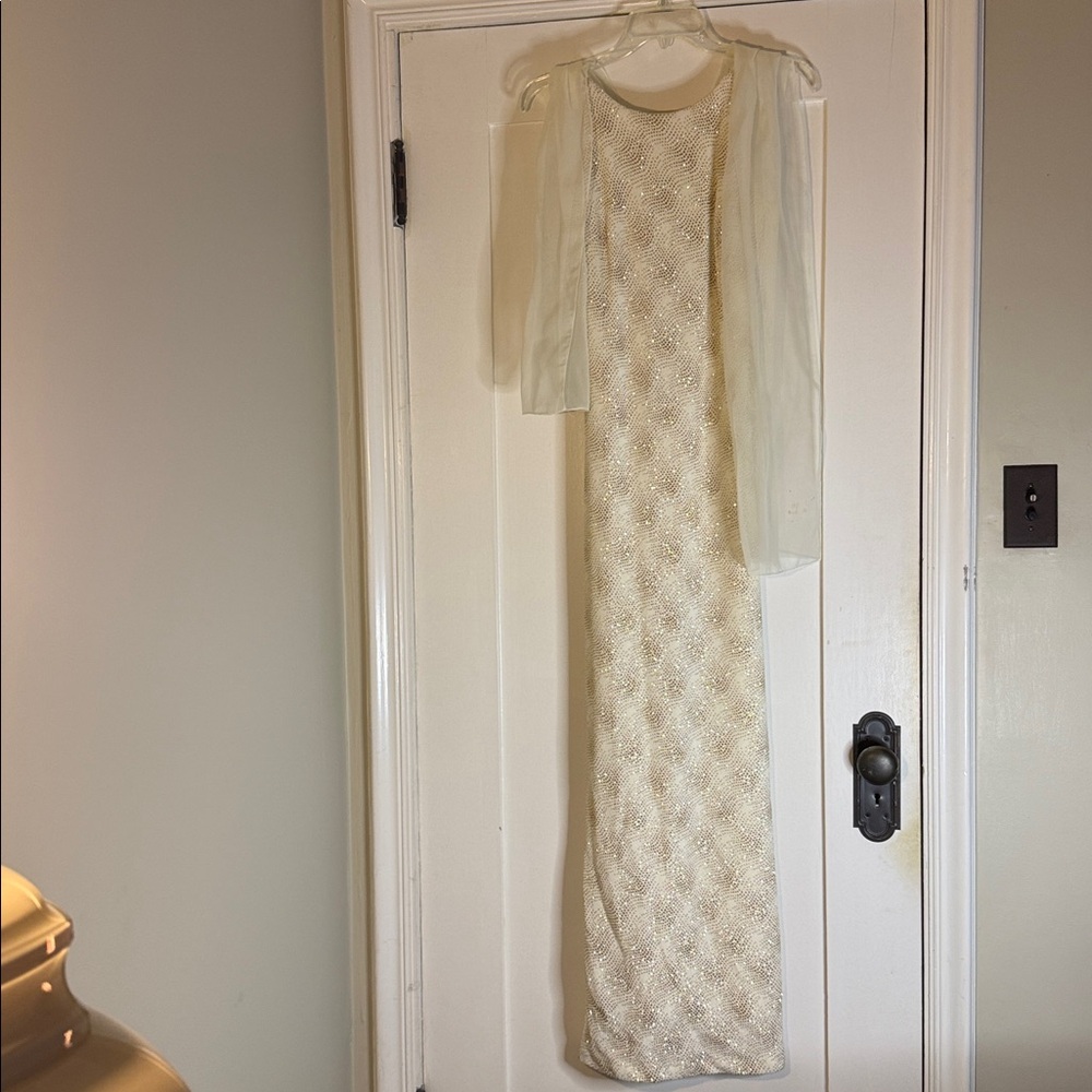 Worn once 4 prom. Floor length, strappy with scarf. Originally from Charlotte R